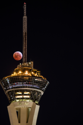 Lunar eclipse in Las Vegas with stratosphere. Flickr: tslclick